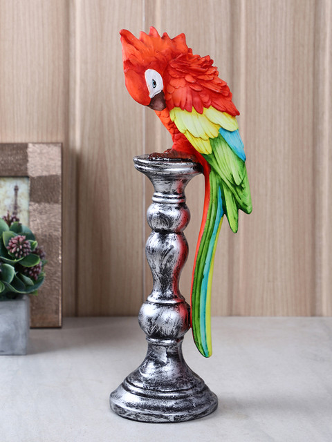 

TIED RIBBONS Silver-Toned & Red Colorful Parrot Showpiece