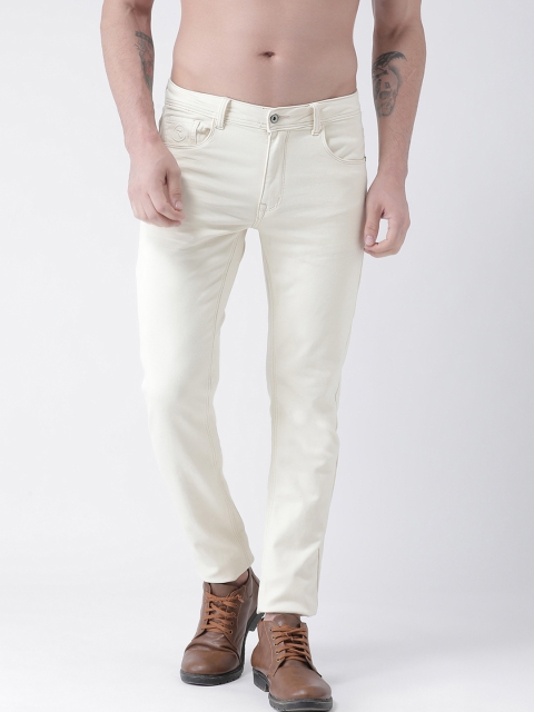 

Rex Straut Jeans Men Beige Tapered Fit Mid-Rise Clean Look Stretchable Jeans