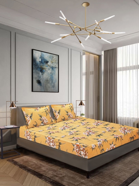 

Aura Yellow Floral 144 TC Cotton 1 King Bedsheet with 2 Pillow Covers