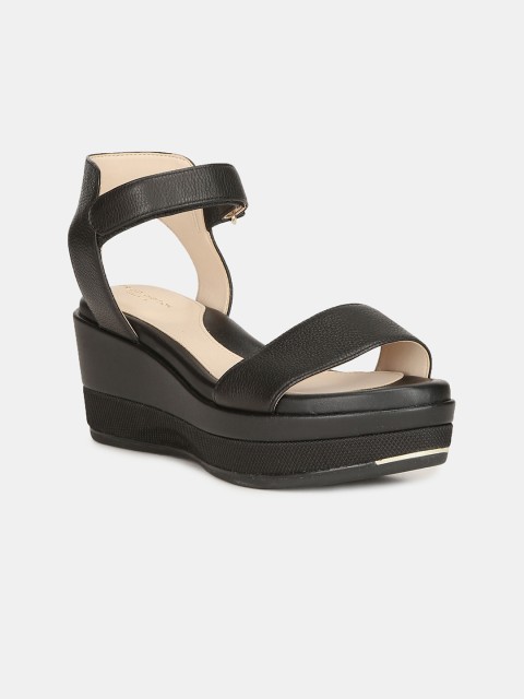 

Cole Haan Women Black Solid Leather Wedges