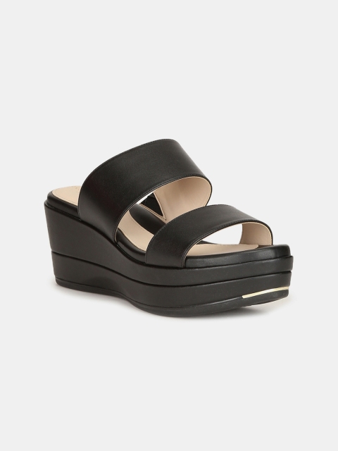 

Cole Haan Women Black Solid Leather Wedges