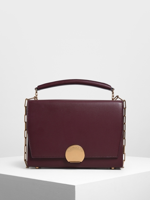 

CHARLES & KEITH Burgundy Solid Handheld Bag