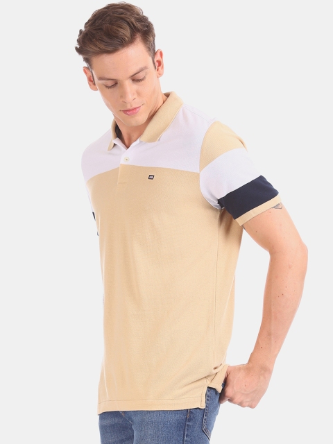 

Arrow Men Beige Solid Polo Collar T-shirt