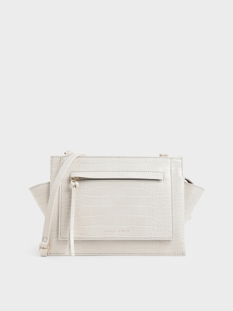 

CHARLES & KEITH Off-White Textured Sling Bag