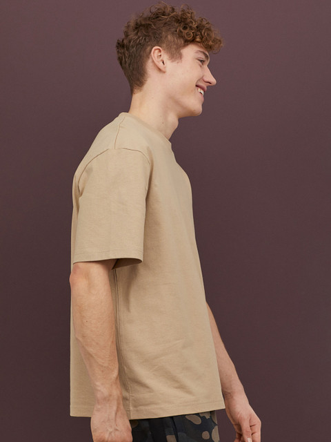 

H&M Men Beige Solid T-shirt Relaxed Fit