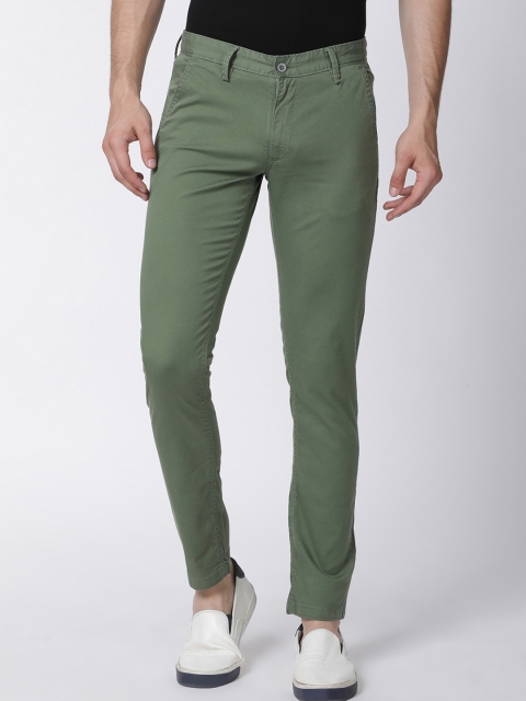 

Mucho Solo Men Olive Green Skinny Fit Solid Regular Trousers