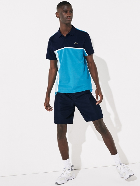 

Lacoste Men Sea Green & Navy Blue Colourblocked Ultra-Light Cotton Tennis Polo