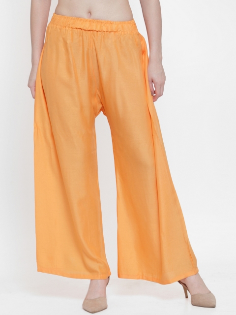 

TAG 7 Women Orange Solid Flared Palazzos