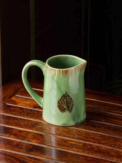 

ExclusiveLane Green & Brown Banyan Leaves Handpainted Ceramic Water Jug