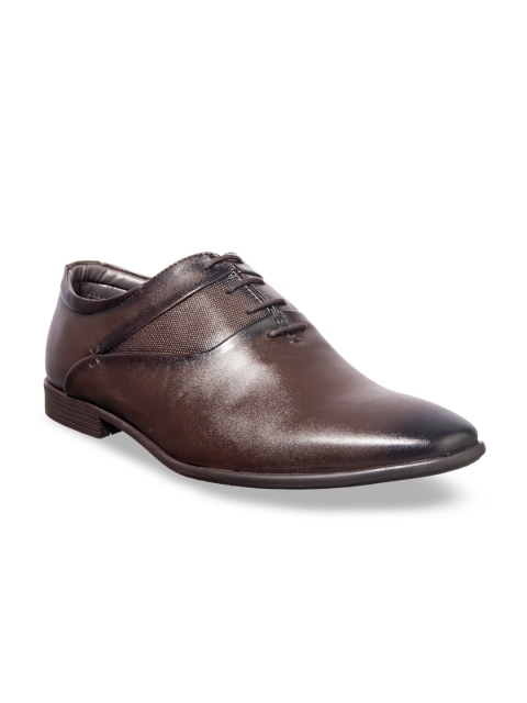 

Khadims Men Brown Solid Formal Oxfords