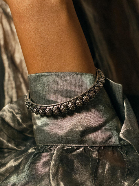 

Zariin Silver-Toned Brass White Gold-Plated Handcrafted Bangle-Style Bracelet