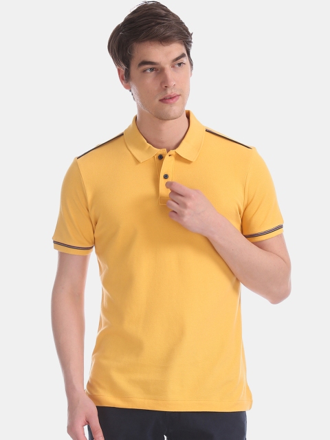 

Arrow Sport Men Yellow Solid Polo Collar T-shirt