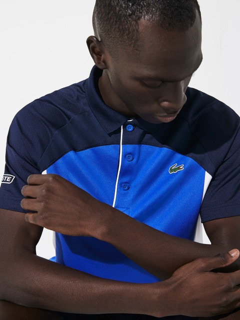 

Lacoste Men Blue Colourblocked Polo Collar T-shirt