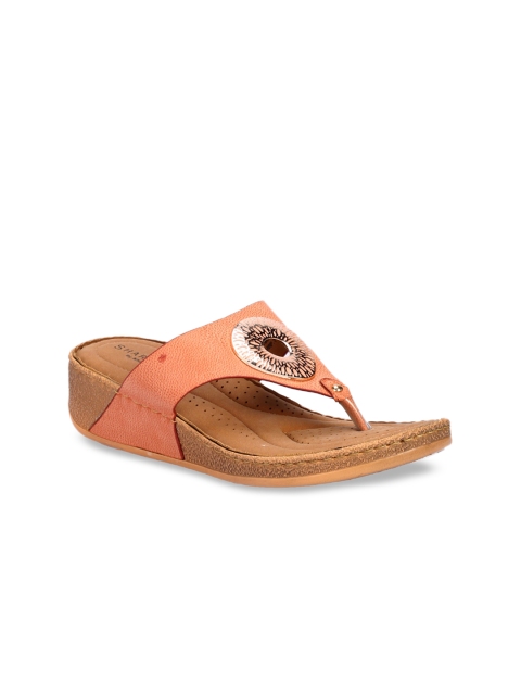 

Khadims Women Peach-Coloured Embellished Wedges