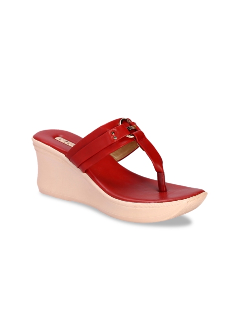 

Khadims Women Red Embellished Wedges