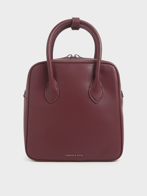 

CHARLES & KEITH Burgundy Solid Handheld Bag