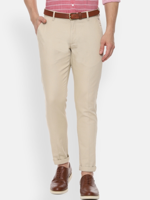 

Louis Philippe Sport Men Beige Slim Fit Self Design Regular Trousers
