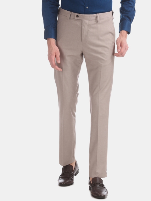 

Arrow Men Beige Tapered Fit Solid Formal Trousers