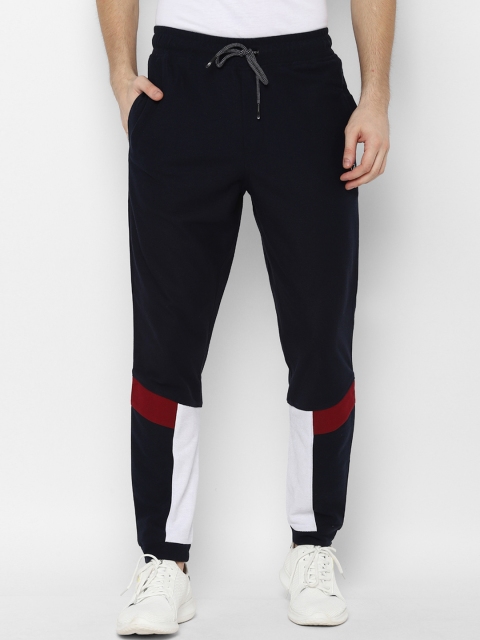 

SKULT by Shahid Kapoor Men Navy Blue & White Colourblocked Slim-Fit Joggers