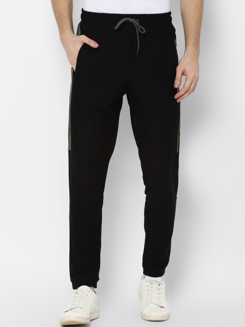

SKULT by Shahid Kapoor Men Black Solid Slim-Fit Joggers