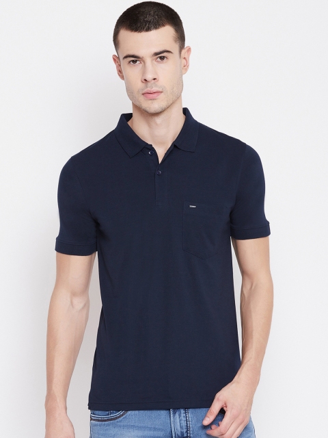 

Okane Men Navy Blue Solid Polo Collar T-shirt
