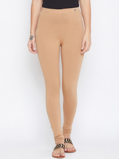 

ALIZA Women Beige Solid Churidar-Length Leggings