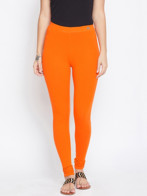 

ALIZA Women Orange Solid Churidar-Length Leggings