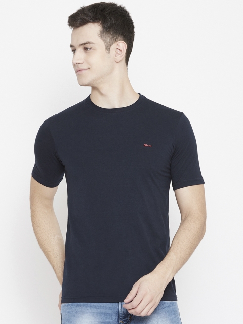 

Okane Men Navy Blue Solid Round Neck T-shirt