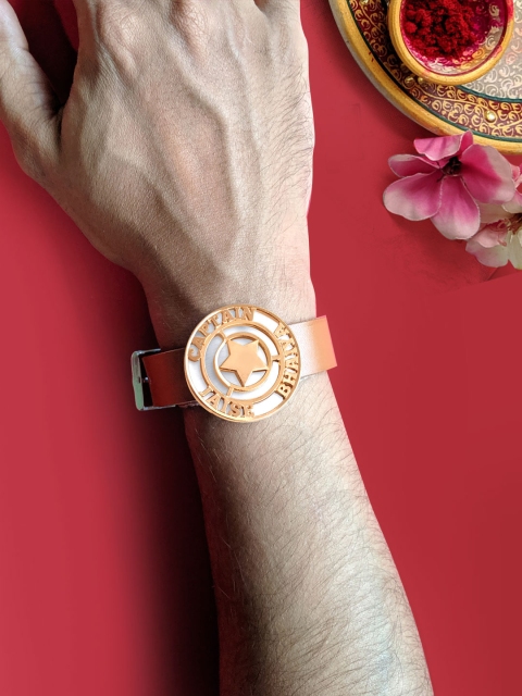 

Foxy Sperks Men Gold Alloy Captain Jaise Bhaiyya Name Design Rakhi