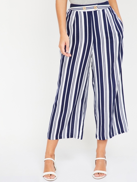 

Ginger by Lifestyle Women Off-White & Navy Blue Regular Fit Printed Regular Trousers