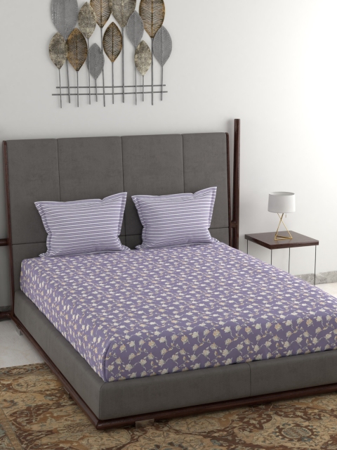 

Trident Purple & White Floral 120 TC Cotton 1 Queen Bedsheet with 2 Pillow Covers