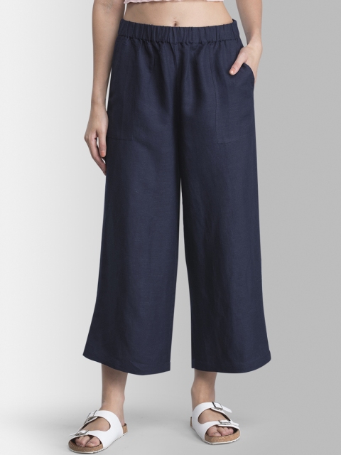 

FableStreet Women Navy Blue Loose Fit Solid Anti Fit Trousers
