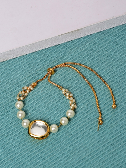 

Yellow Chimes Women Gold-Toned & White Bracelet Handcrafted Bracelet