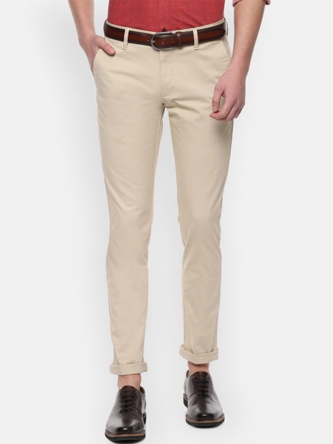 

Louis Philippe Sport Men Beige Slim Fit Solid Regular Trousers
