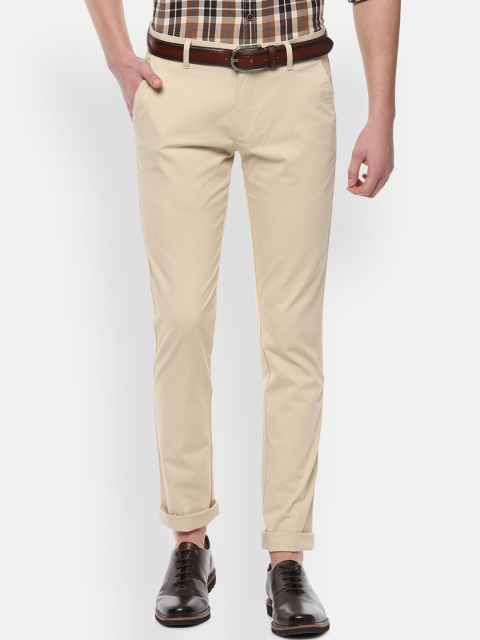 

Louis Philippe Sport Men Beige Slim Fit Self Design Regular Trousers