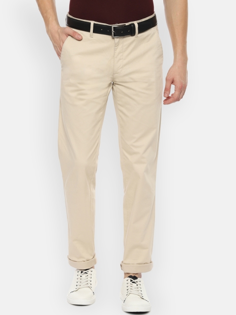 

Louis Philippe Sport Men Beige Slim Fit Solid Regular Trousers