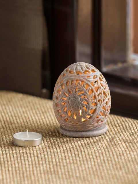 

ExclusiveLane Beige The Dazzling Mughal Hand Carved Table Tea-Light Candle Holder