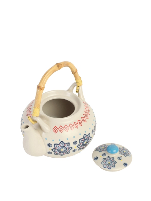 

Chumbak Off White Autumn Leaves Assortment Kettle