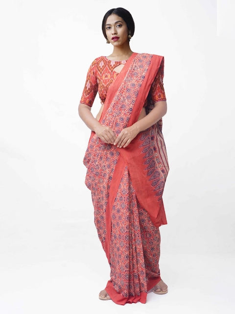 

Unnati Silks Red & Coral Pure Mulmul Cotton Ajrakh Printed Saree