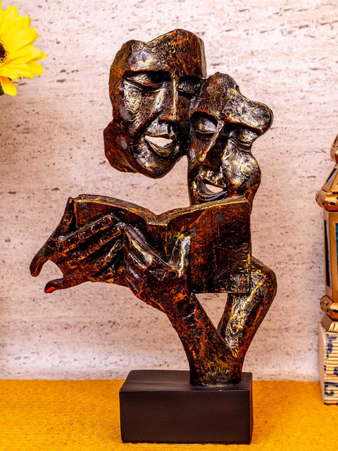 

TIED RIBBONS Black & Gold-Toned Face Statue