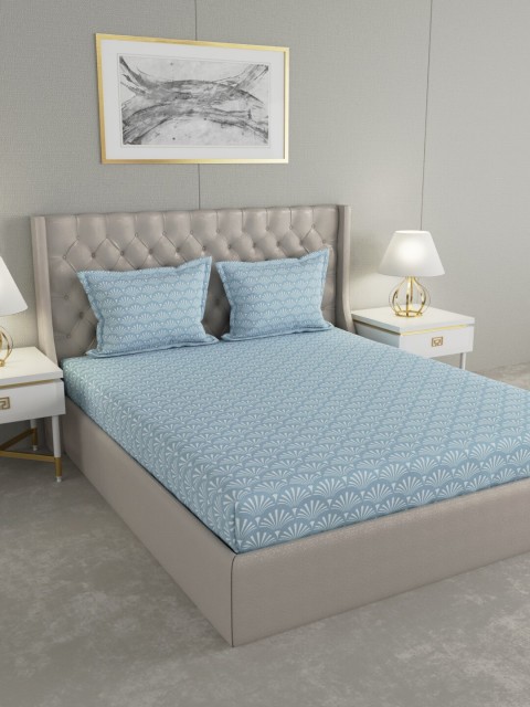 

Trident Blue & White Floral 144 TC Cotton 1 King Bedsheet with 2 Pillow Covers
