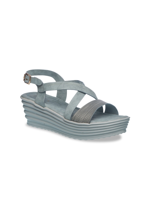 

Khadims Women Teal Blue Solid Platforms