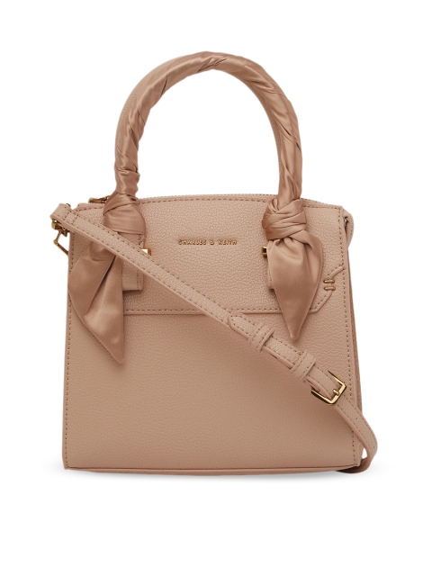 

CHARLES & KEITH Nude-Coloured Solid Handheld Bag