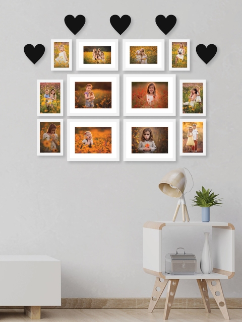 

RANDOM Set Of 12 White Solid Collage Photo Frames With Black Heart Plaques