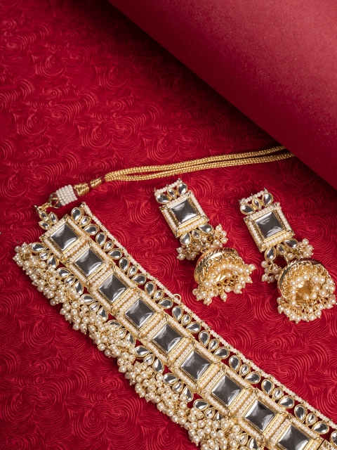 

Shoshaa Women Gold Plated Silver-Toned & Off-White Kundan Studded Jewellery Set