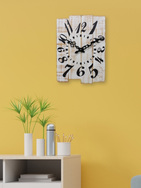 

Aura Beige Abstract Shaped Solid Analogue Wall Clock