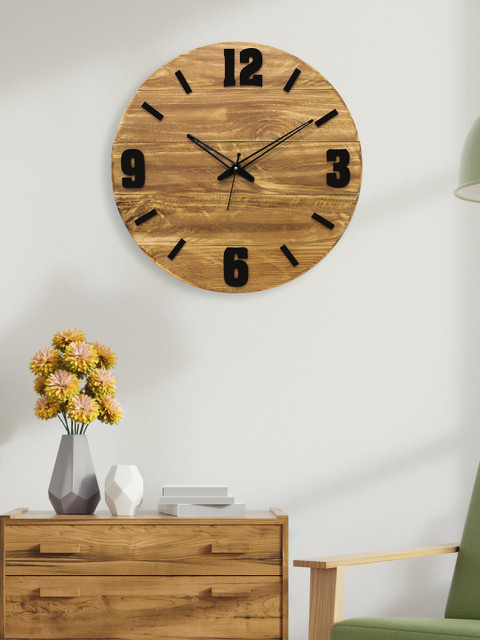 

Aura Brown Round Solid Analogue Wooden Wall Clock (15 x 15 x 2)
