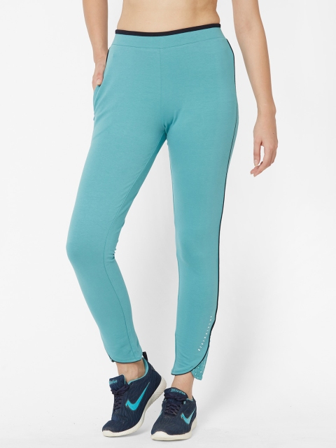 

Sweet Dreams Women Turquoise Blue Solid Slim-Fit Track Pants