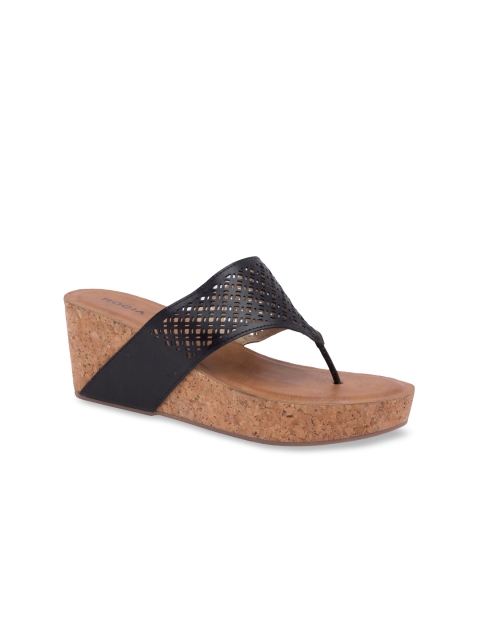 

Rocia Women Black Solid Heels