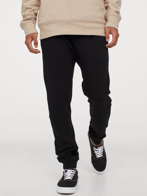 

H&M Men Black Solid Sweatpants Tapered Fit